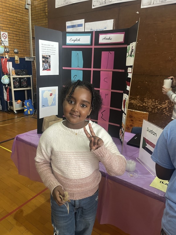 Students pose with their Cultures Day presentation