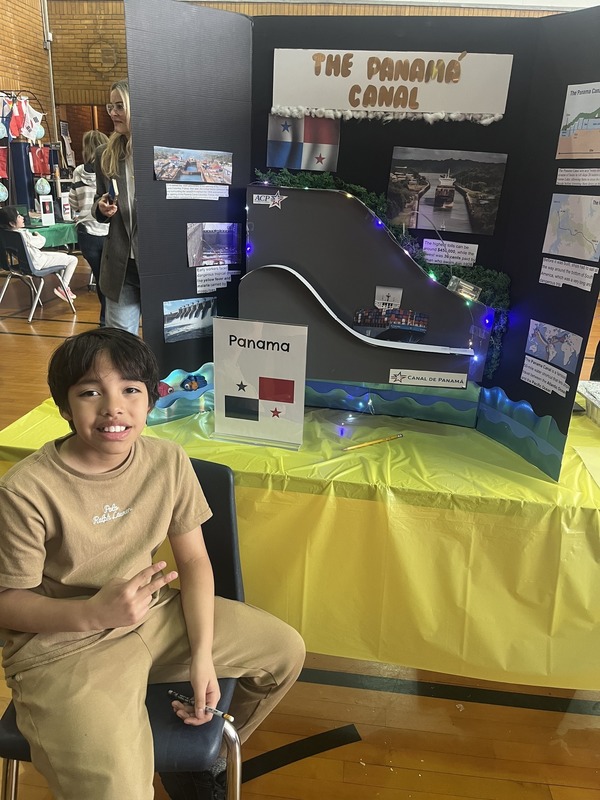 Students pose with their Cultures Day presentation