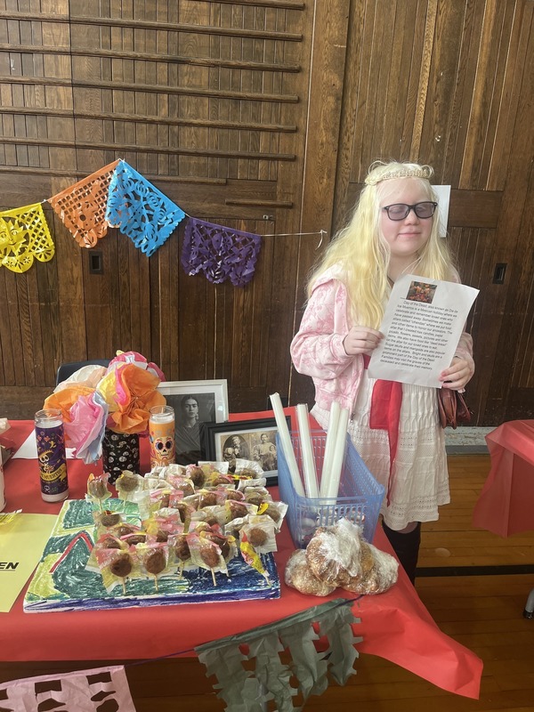 Students pose with their Cultures Day presentation