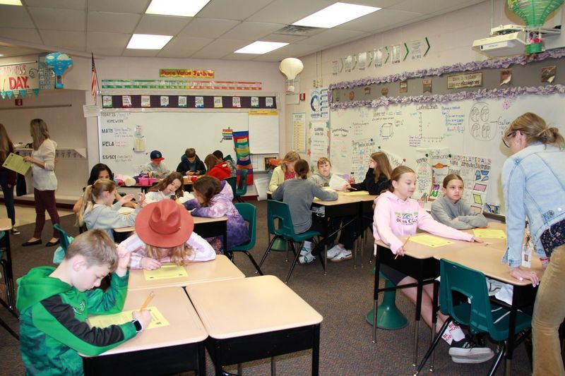 Students brainstorm how they can help their fellow classmates