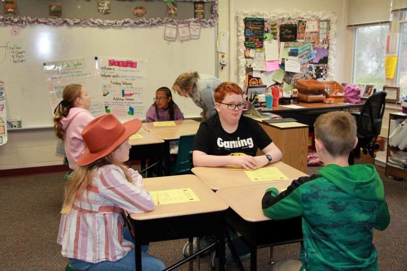 Students brainstorm how they can  help their fellow classmates