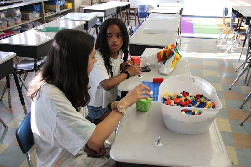 Students building with legos