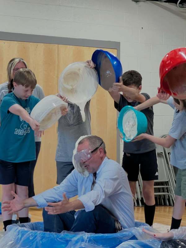 Dr. Kenyon and Mr. Godshalk become human sundaes