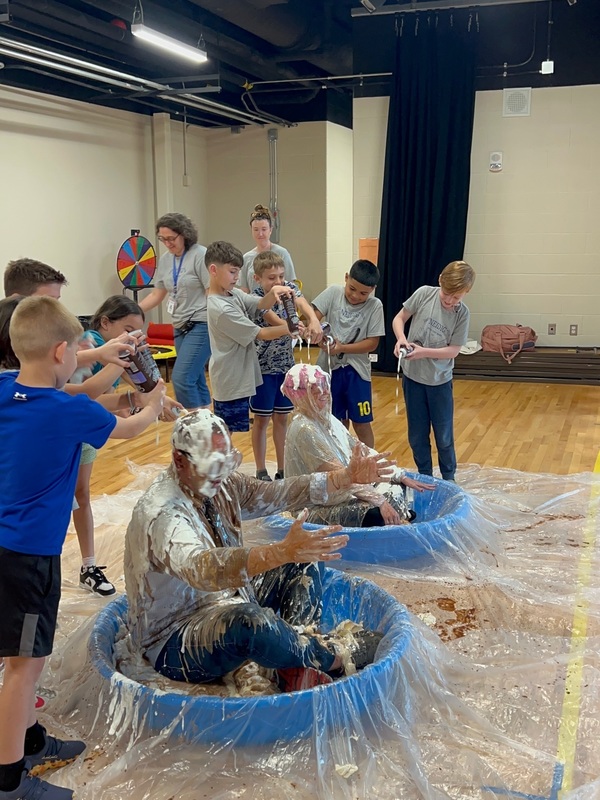 Dr. Kenyon and Mr. Godshalk become human sundaes