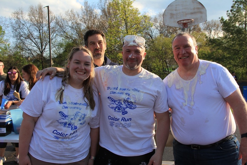The Pie contestants smile with Dr. Schmucker