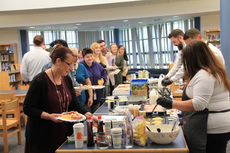 Principal Dr. Crater and Assistant Principals Mr. Smith and Ms. Maddon serve up breakfast for teacher appreciation week