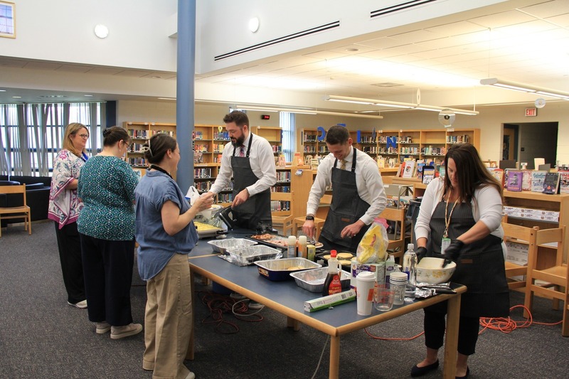 Principal Dr. Crater and Assistant Principals Mr. Smith and Ms. Maddon serve up breakfast for teacher appreciation week