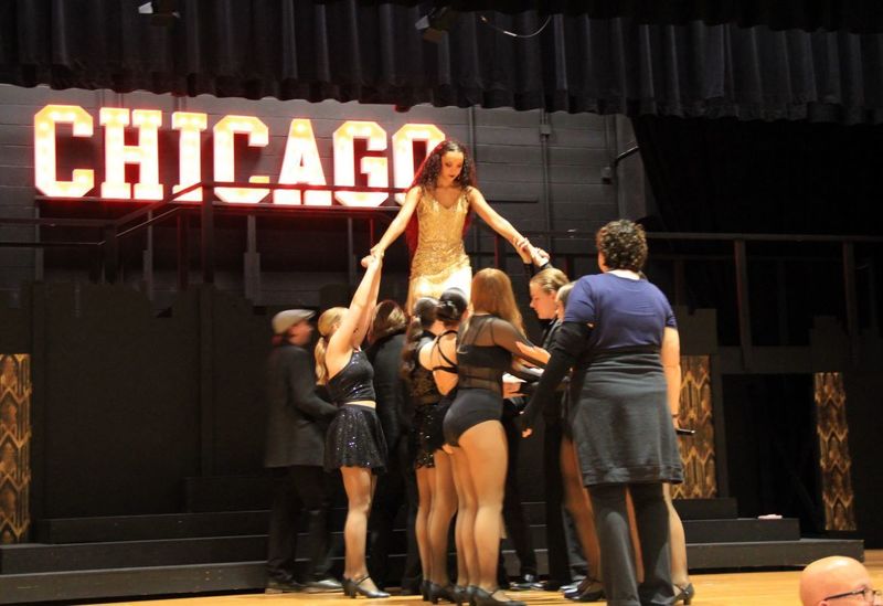 Elena Ritter practices an aerial lift and flip.