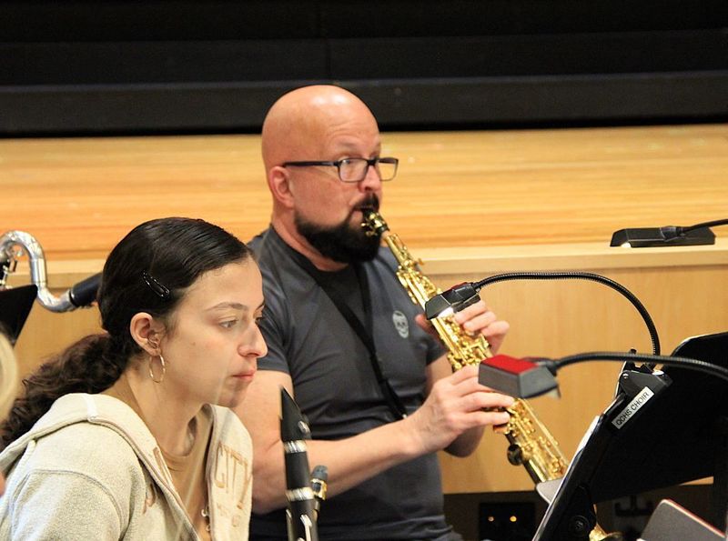Mr. Frank Parker performing in the orchestra pit.