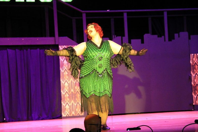 Evie Moyer performs as Mama Morton