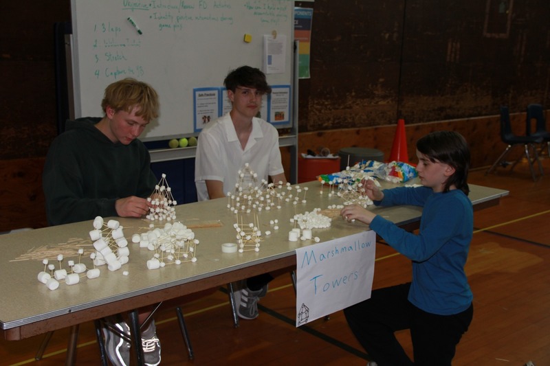 Children make marshmallow towers