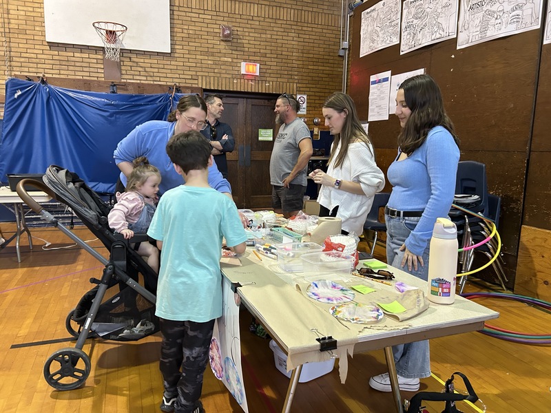 A family working at the Chromatography station
