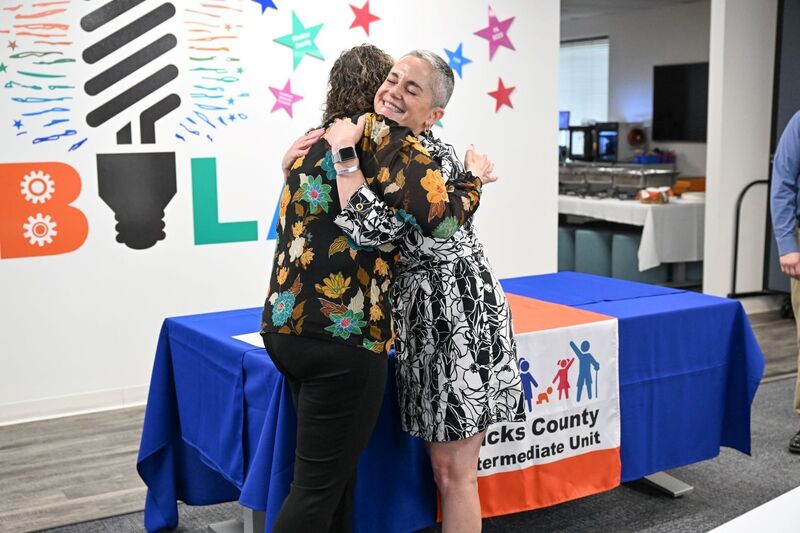 Dr. Hoffman and Robbie DiStefano hug