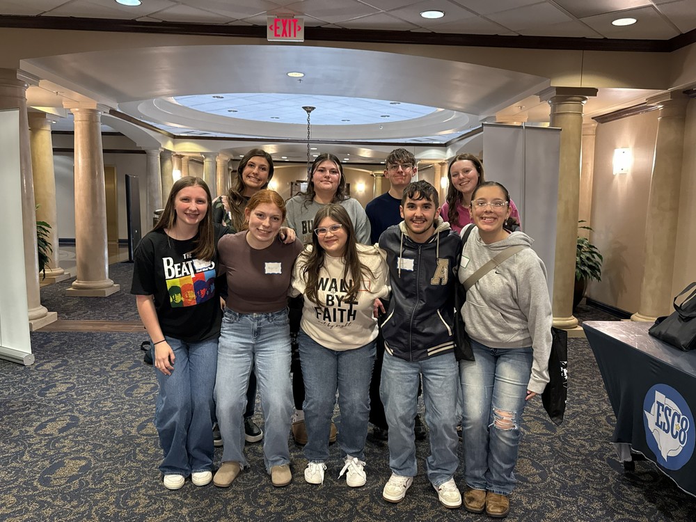 group of students from Queen City High School attending a conference at the Region 8 Service Center