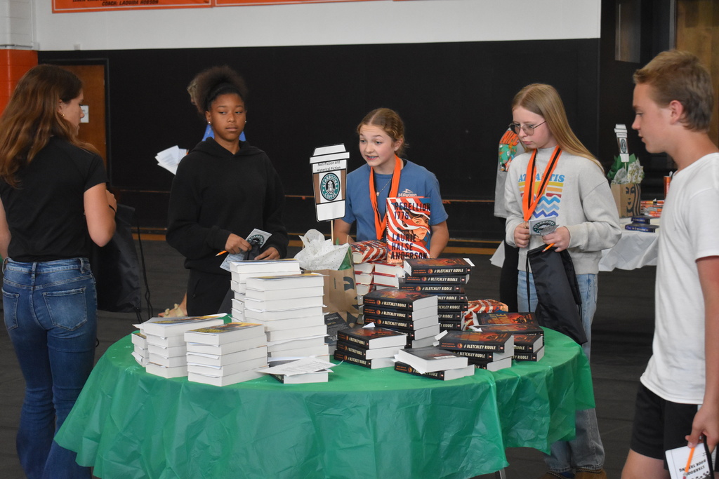 students trying to decide which books to choose