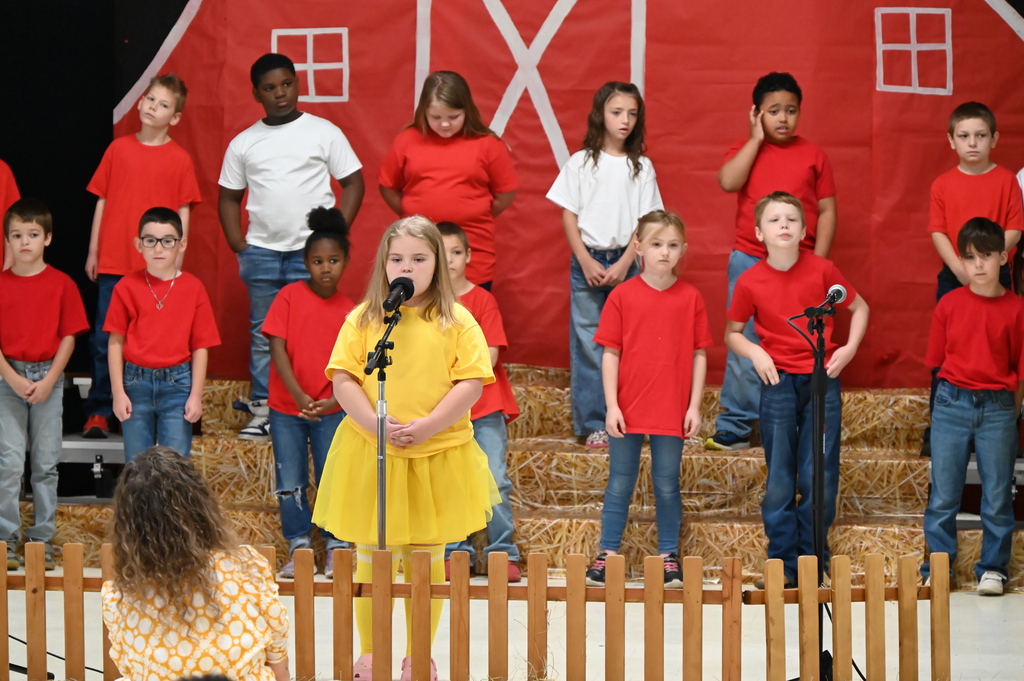 2nd grade students at JKH presenting The Cheese Stands Alone.