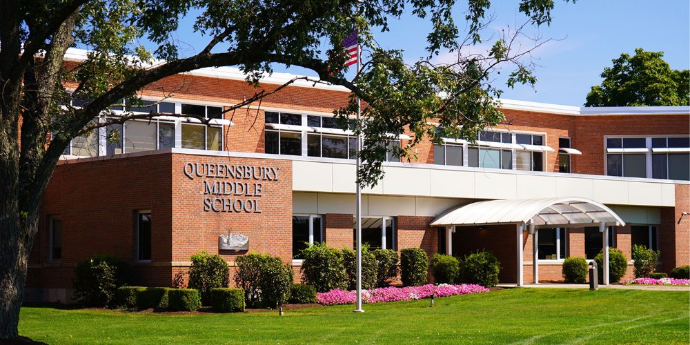 Photo of the front of Queensbury Middle School.