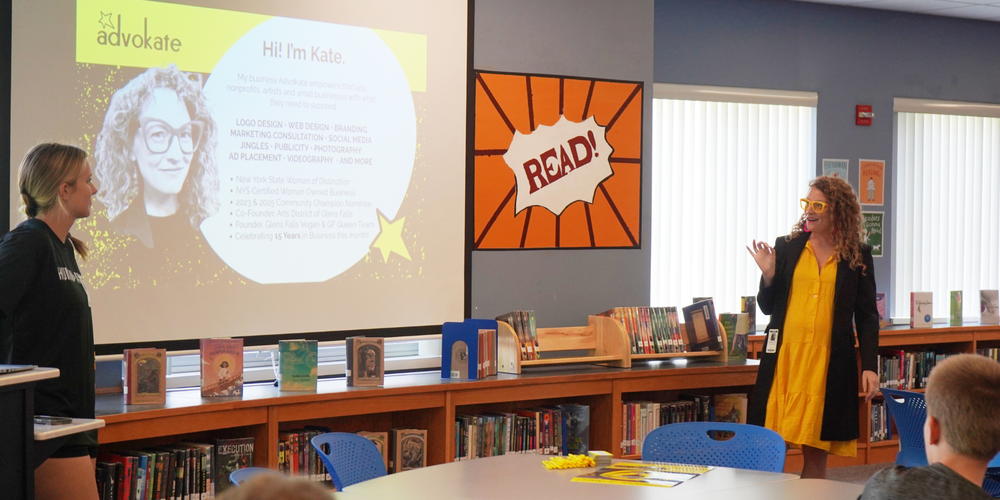 Kate Austin presents to students at QMS.