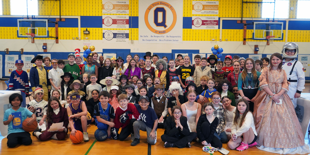 Group of students dressed up for a living Wax Museum.