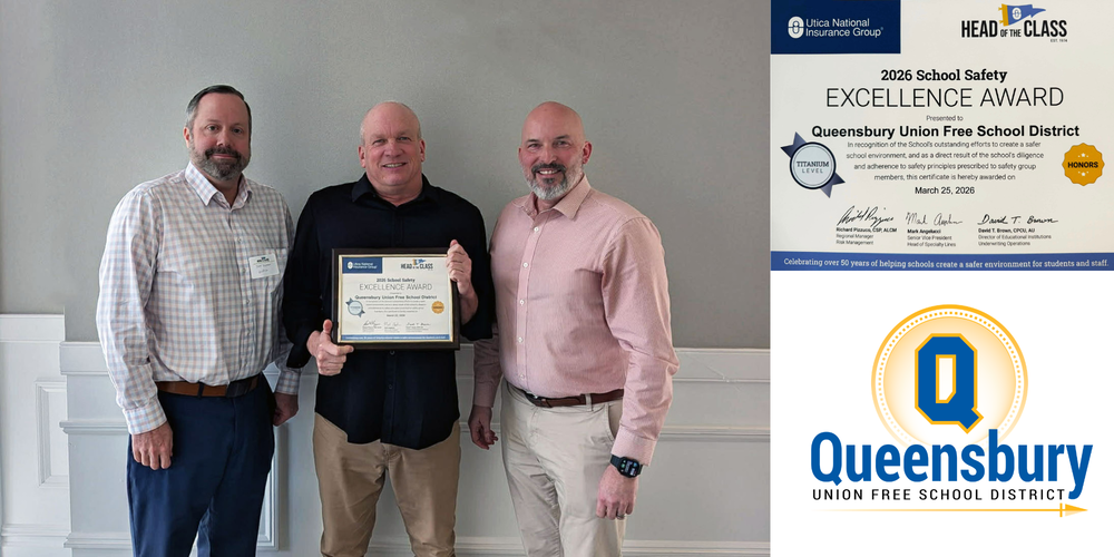 Three people accept Safety Award.