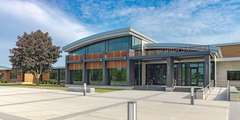 Front view of Queensbury High School building.