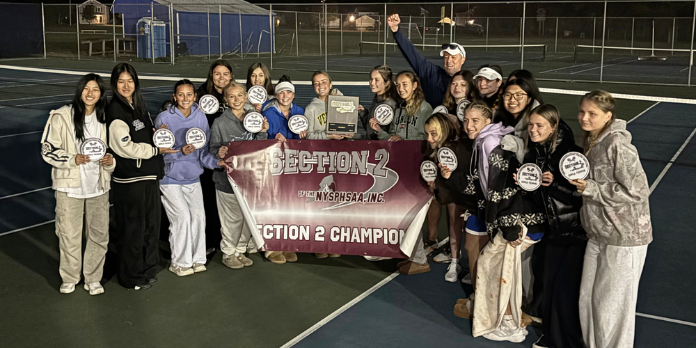 The Queensbury girls varsity tennis team wins sectional championship.