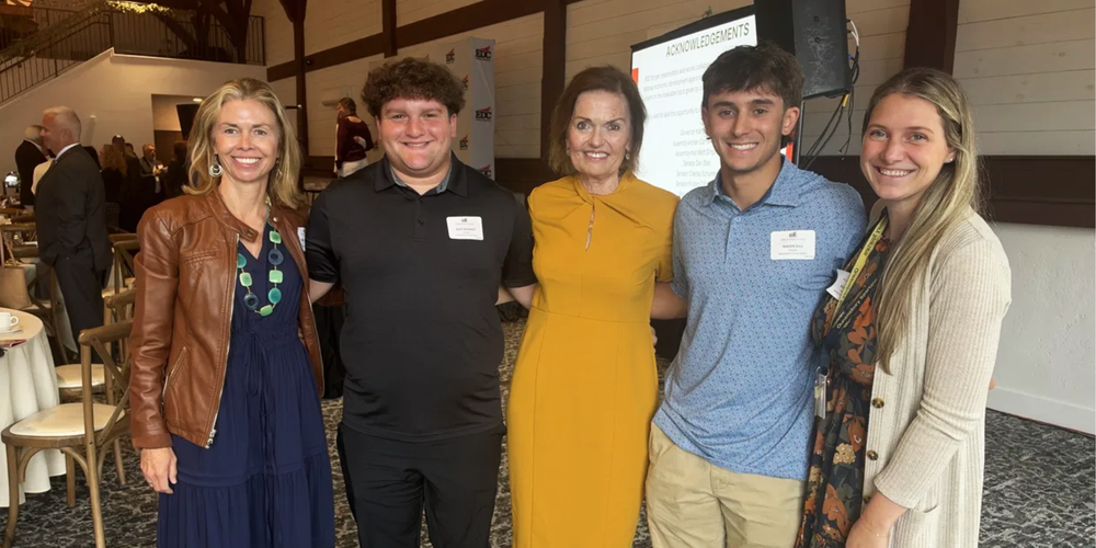 QHS students Riley Nissinoff (second from left) and Mason Ball (second from right) with Kate Hogan, Kelly Close and Sarah Hogan-Gauci at the EDC Warren County Annual Luncheon.