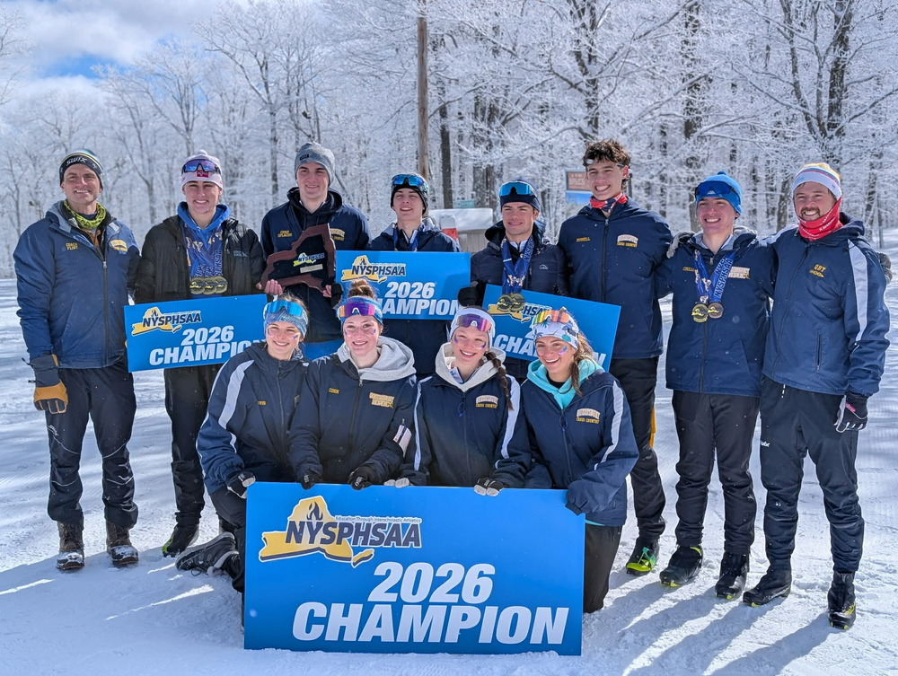 Photo of boys and girls Nordic ski teams holding 2026 state champion banners.