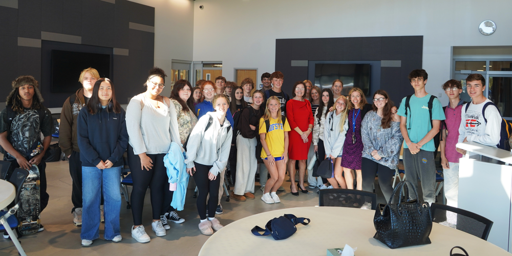 Photo of high school law students with Judge Kathleen Hogan.