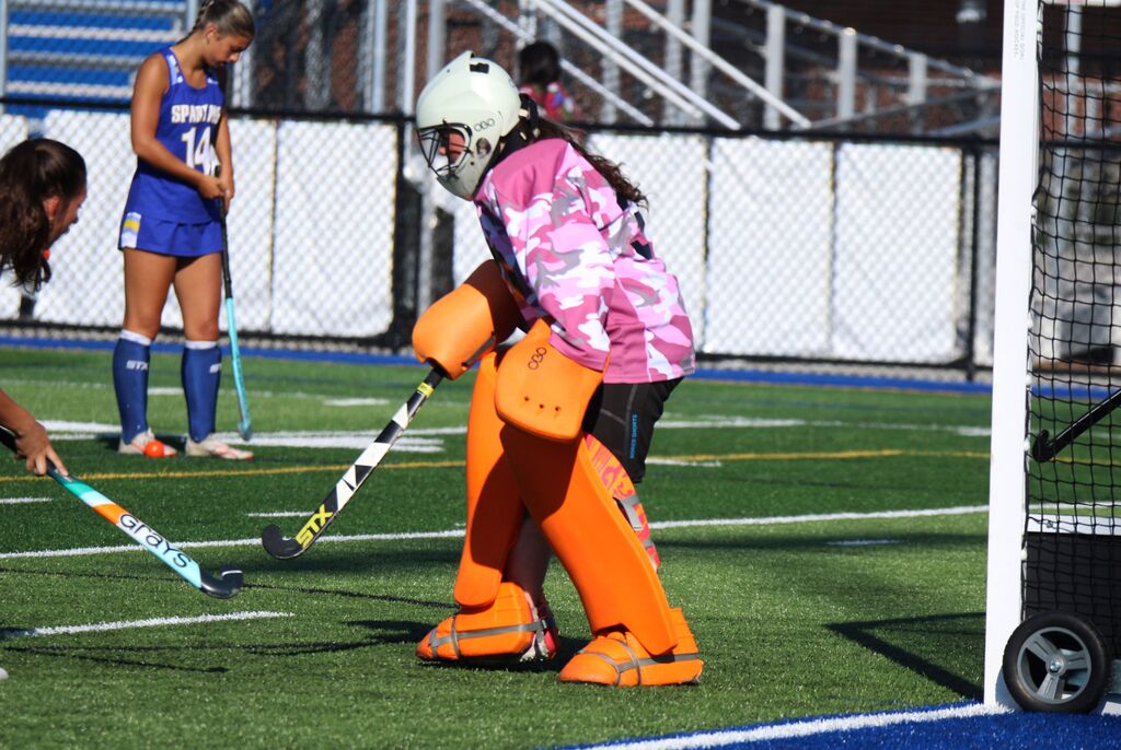 Megan Winne playing field hockey goalie.