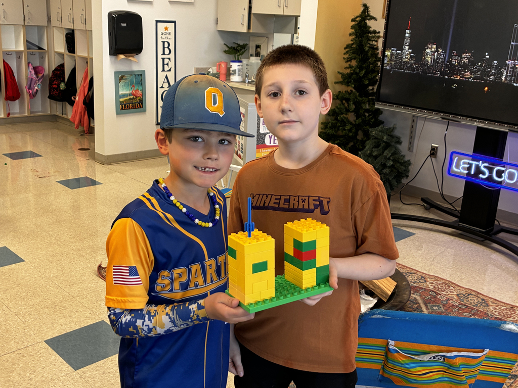 Students build Twin Towers with Lego.