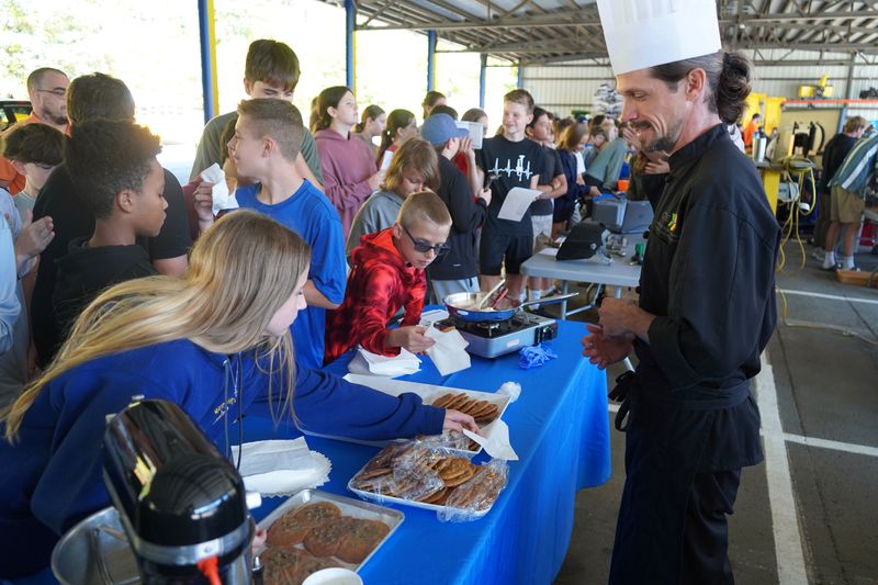 Students sample cookies during CTE Day.
