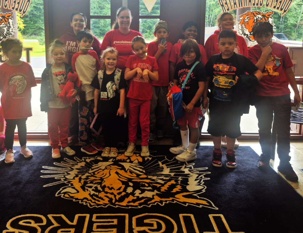 Queets Clearwater Tigers wearing their red shirts or MMIW shirts. 