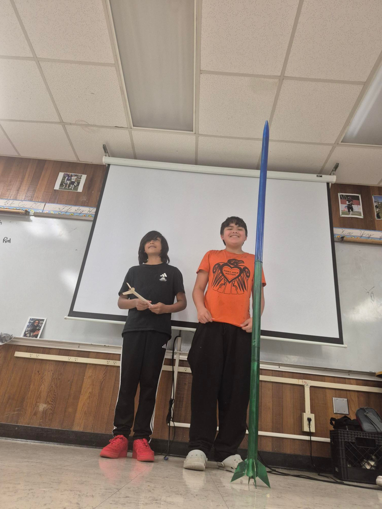 Students with a rocket that is over 6 ft tall 