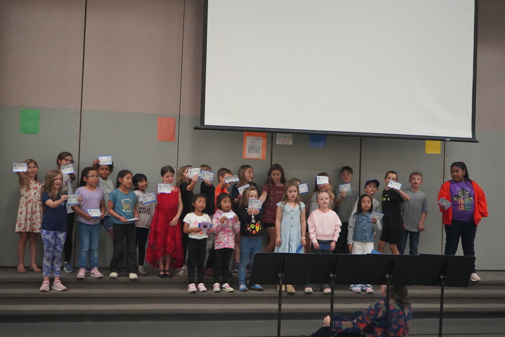 Singing about library cards!