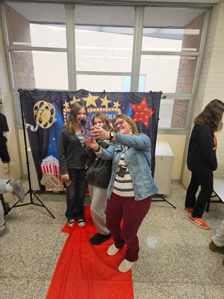 Selfies at the QMS March is Reading Month Red Carpet Event