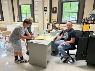 Students practicing making change