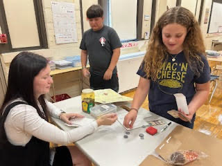 Students practicing making change
