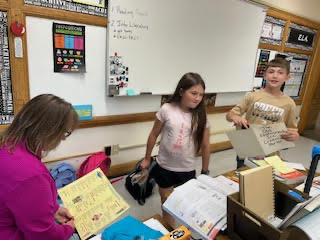 Students practicing making change
