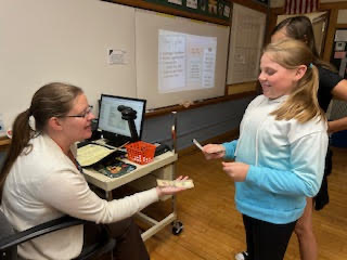 Students practicing making change