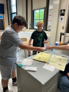 Students practicing making change