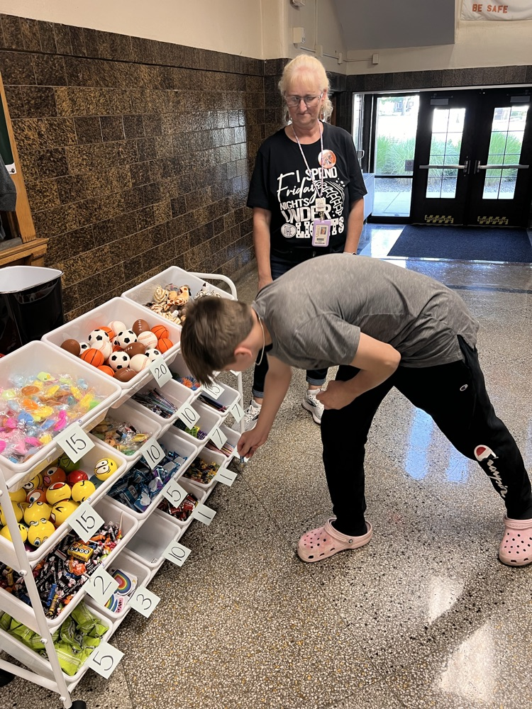 Students shopping at the QMS Pride Ticket Store