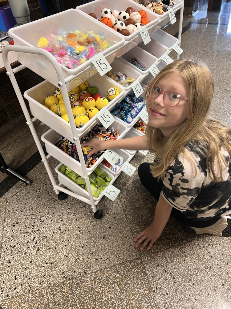 Students shopping at the QMS Pride Ticket Store