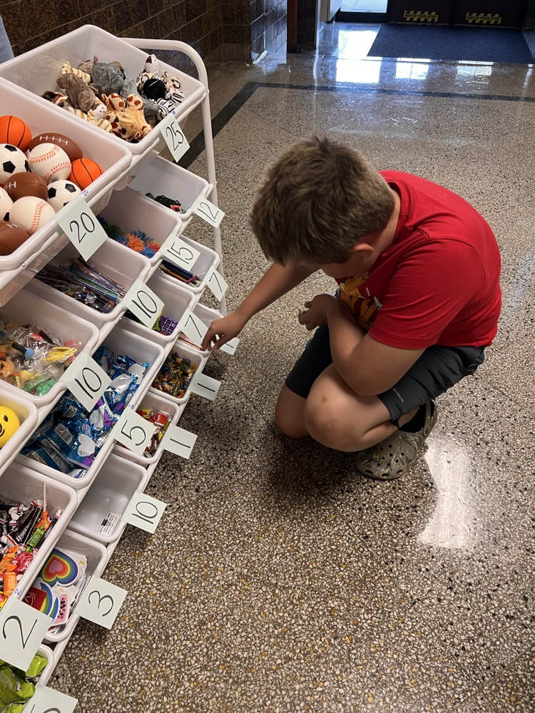 Students shopping at the QMS Pride Ticket Store