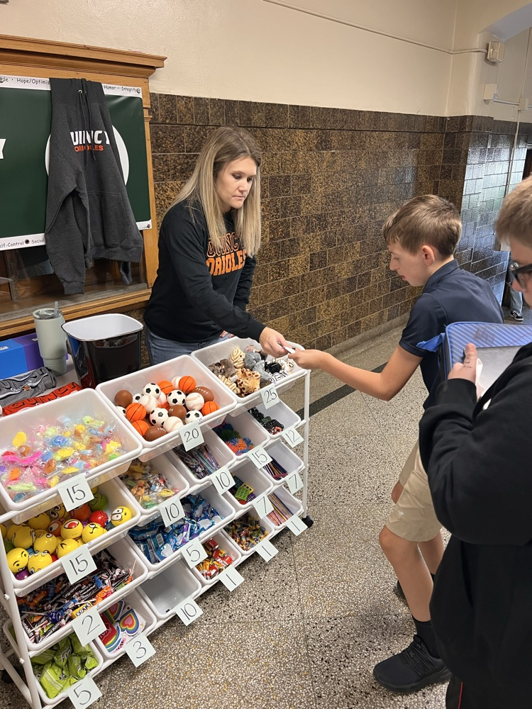 Students shopping at the QMS Pride Ticket Store