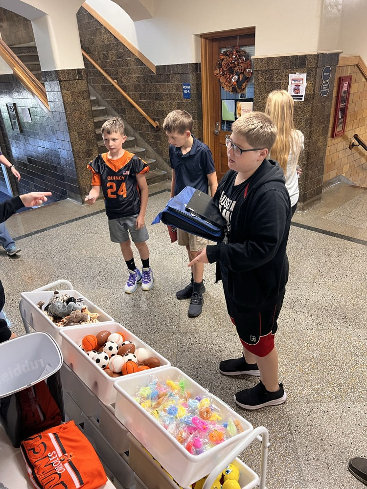 Students shopping at the QMS Pride Ticket Store