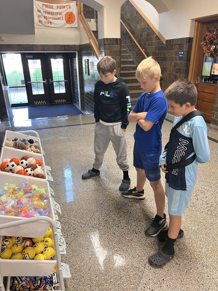 Students shopping at the QMS Pride Ticket Store