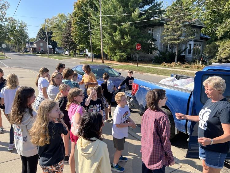 Students helping unload the donation