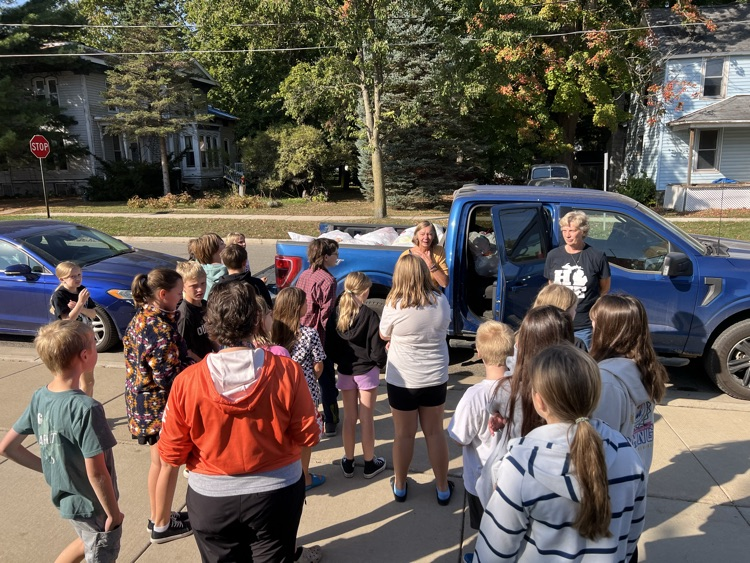 Students helping unload the donation