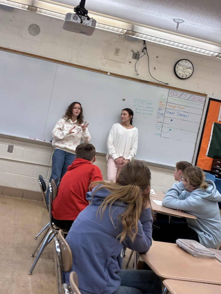 Clare and Brookelyn speaking to QMS students in health class.